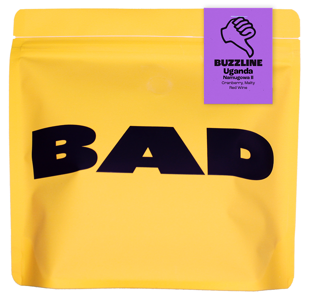 Yellow coffee bag with 'BAD' text and a purple label on a white background