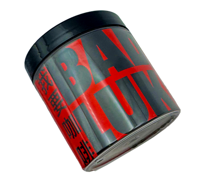 A container of Bad Luk coffee beans with red and black labeling on a transparent background.