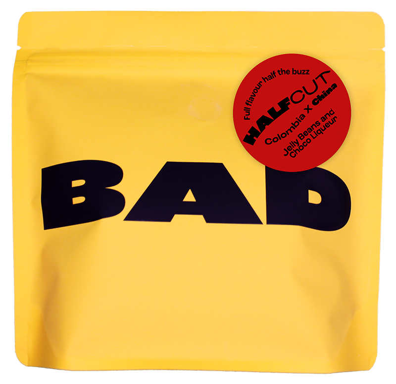 Yellow package with 'BAD' text and a red label describing the contents, half caff specialty coffee