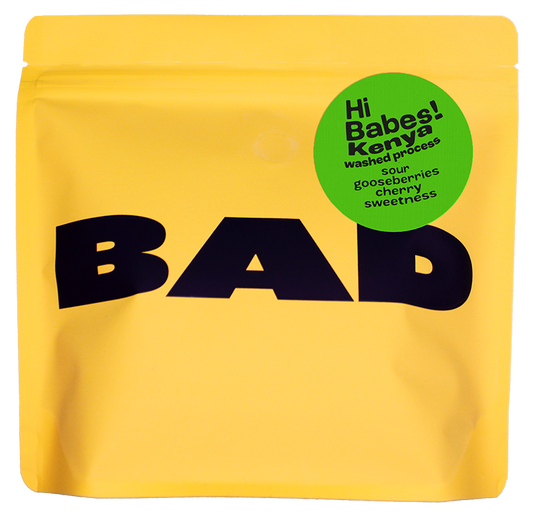 A yellow bag of BAD coffee from Kenya with taste notes of gooseberries, Kenya washed process' and 'Sour gooseberries cherry sweetness'.