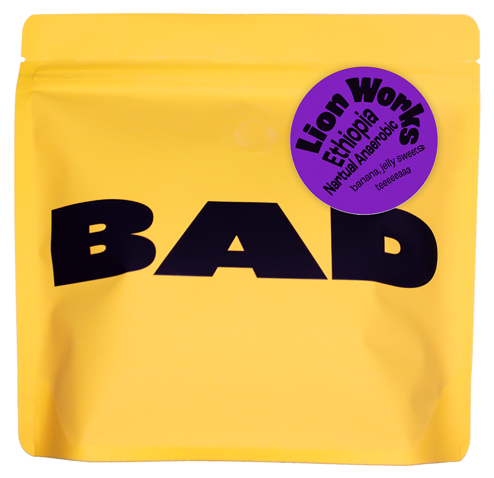 Yellow coffee bag with 'BAD' text and a purple label which reads "Lion Works Ethiopia Natural Anaerobic Fermentation" 